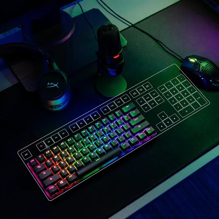 HyperX Alloy Origins 60 stylistic shot of keyboard on desk showing size compared to full size