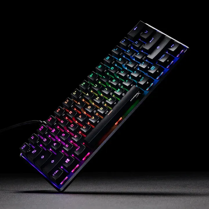 HyperX Alloy Origins 60 stylistic shot with hard white light, showing all RGB colors