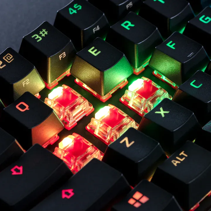 HyperX Alloy Origins 60 WSAD keycaps removed showing bright per-key LEDs