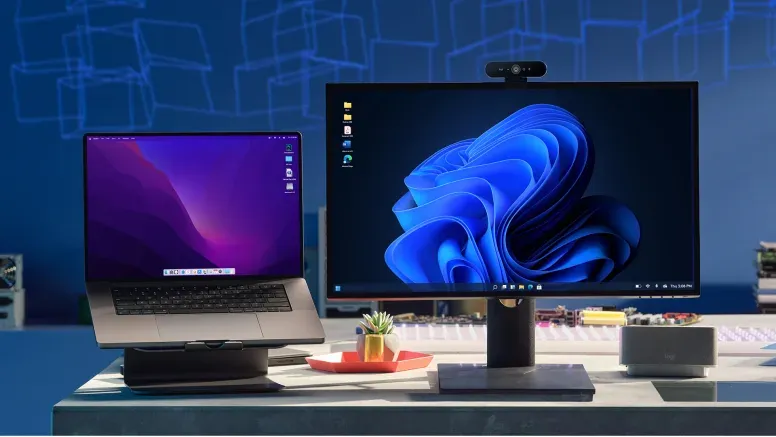 Mac and PC side by side on a desk